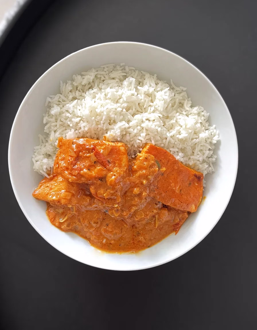 Creamy coconut salmon served with white basmati rice